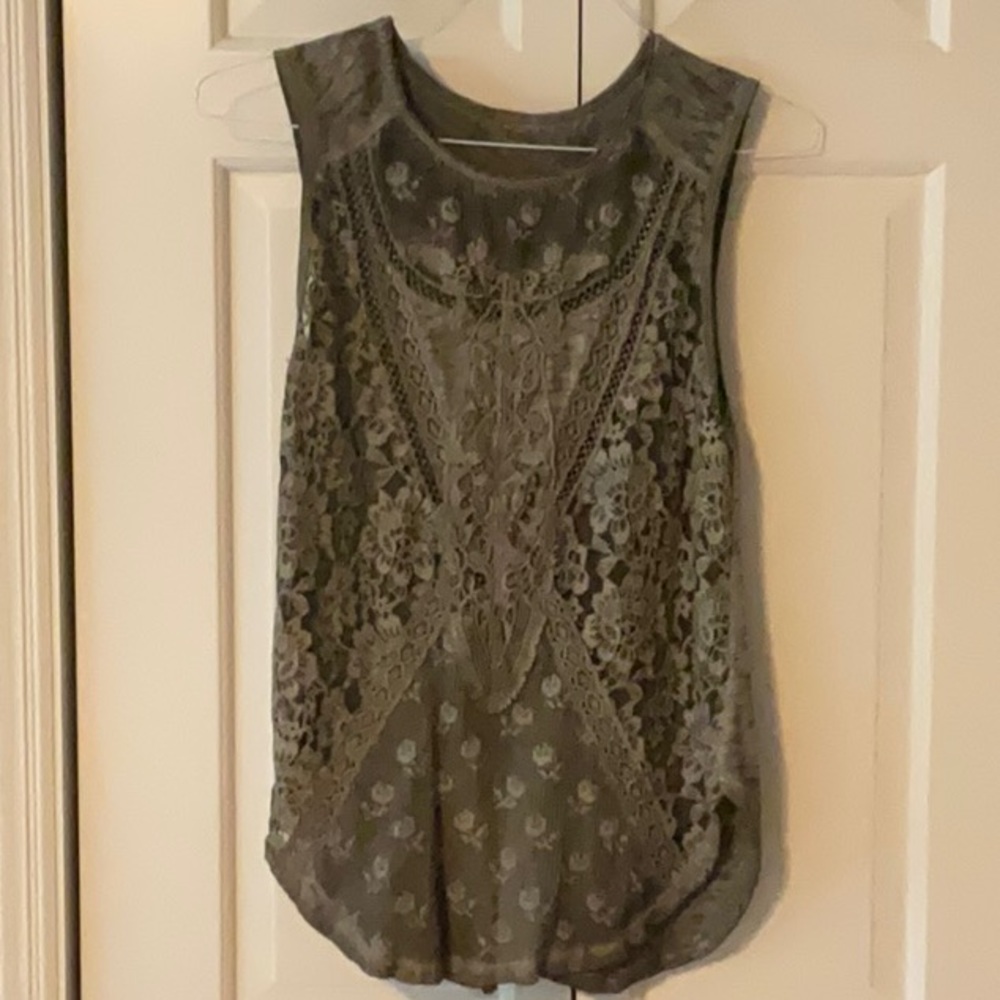 Free  people sleeveless T-shirt with lace detail.